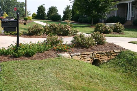 metal culverts house|landscaping around driveway culvert pipes.